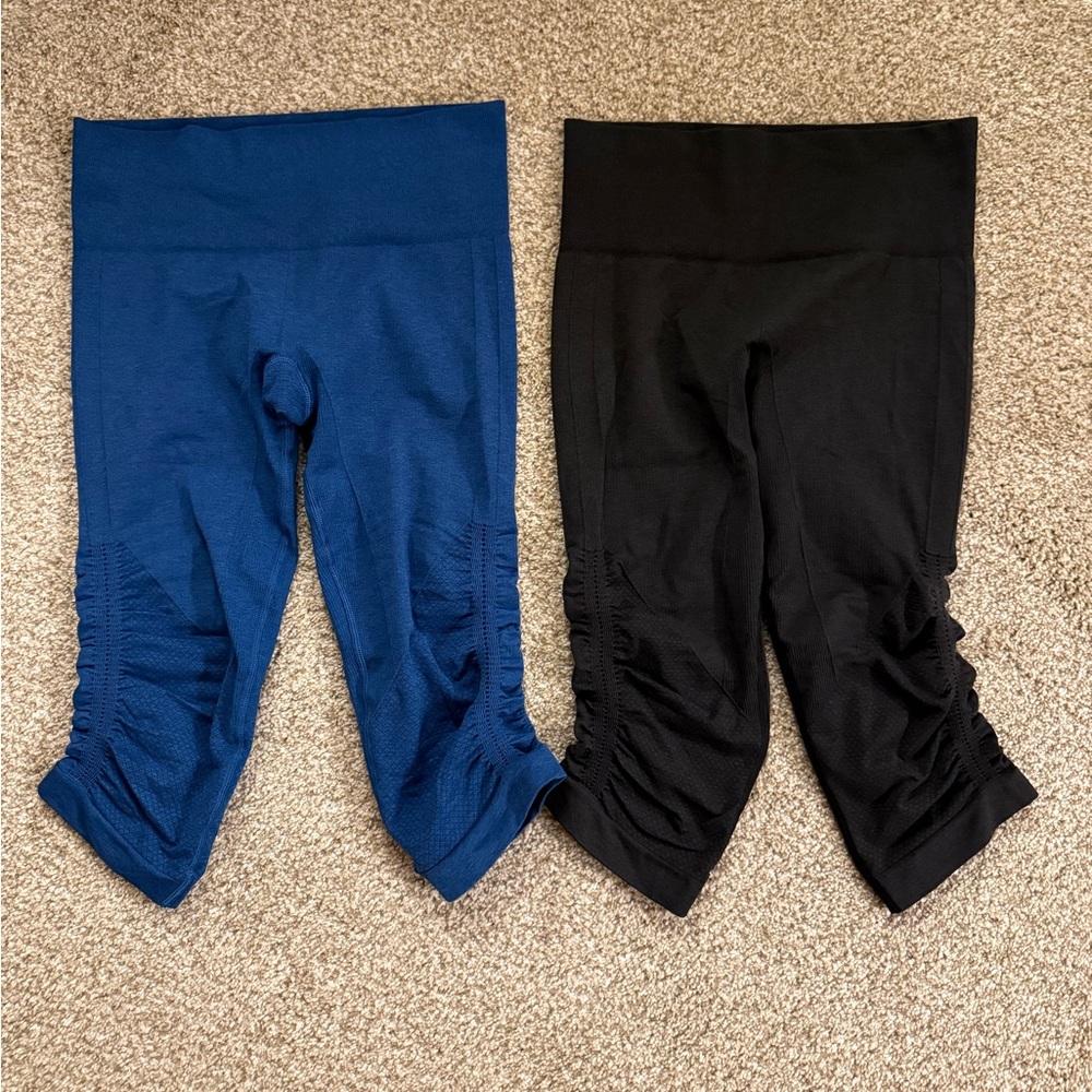 Two pair of Lululemon cropped leggings. Blue and gray